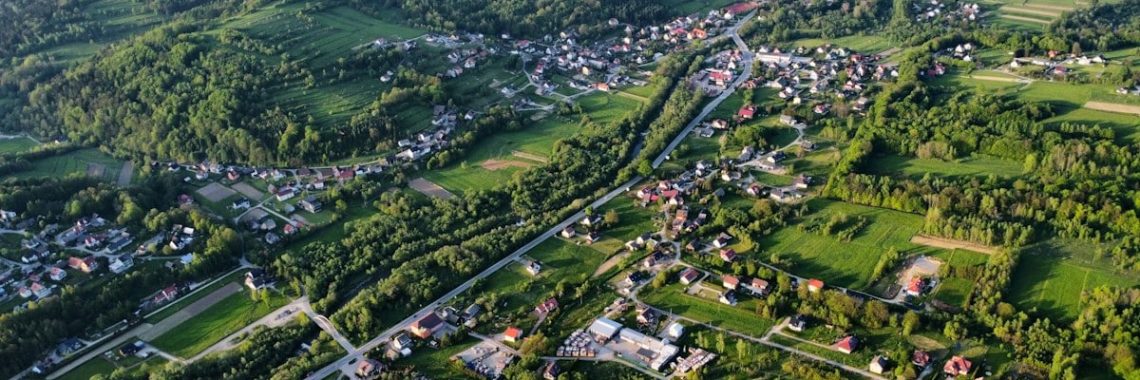 Aerial view of a lush valley and village